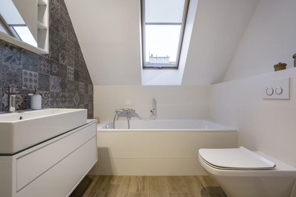 Attic bathroom with bathtub