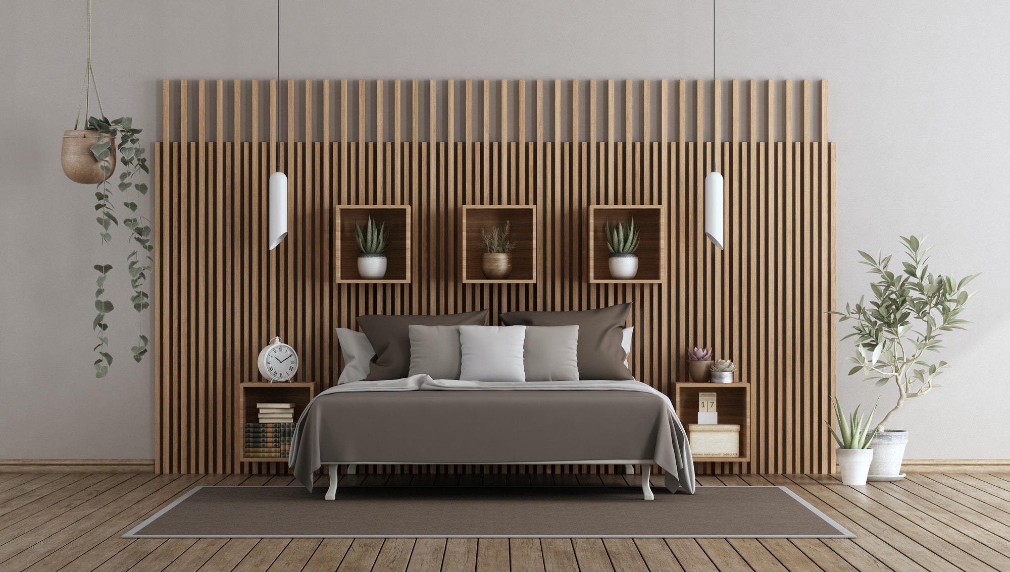Master bedroom with bed against wooden paneling