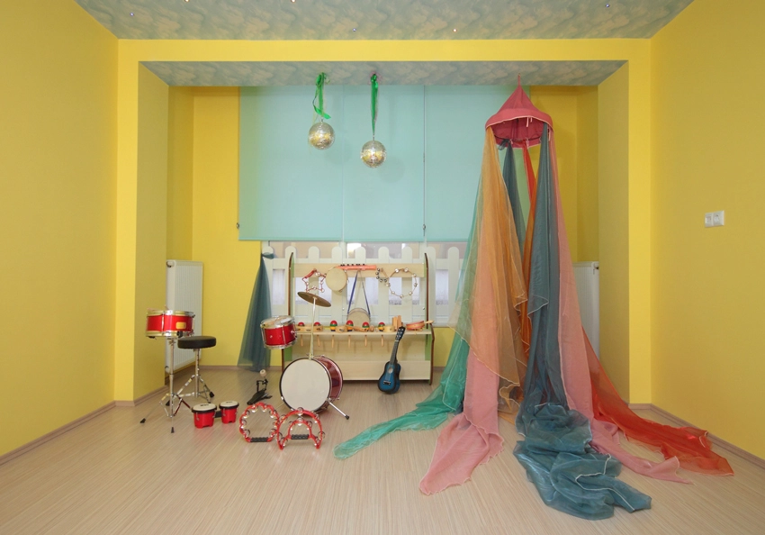 Music room decorated and painted using the primary color palette as recommended by Home Décor Craze.